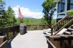 Lower deck with girl and Mountain View at Pet Friendly Home